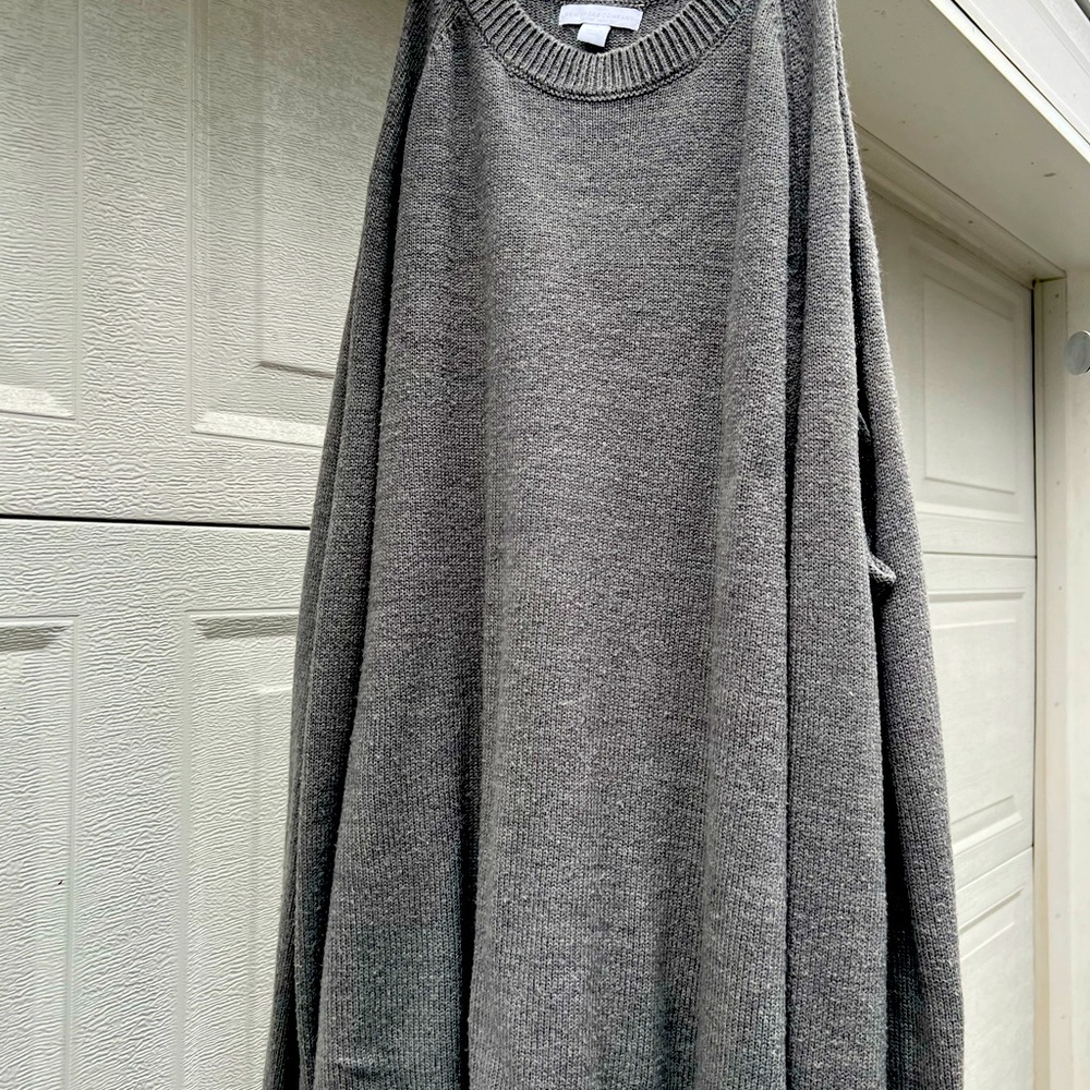 Woman’s open sleeve sweater